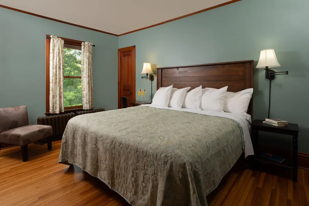 Holly’s Room: king bed, reading chair and garden window