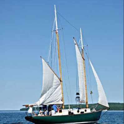 A schooner under full sail near the Apostle Islands