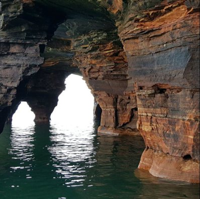 A red sandstone sea arch on Lake Superior